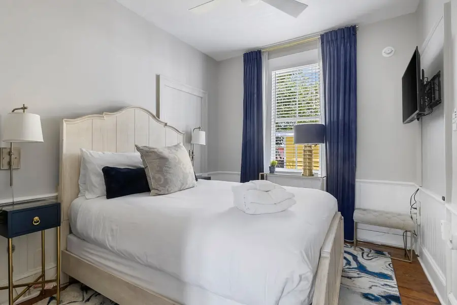 Bedroom #4: Queen Bed + Ceiling Fan + TV