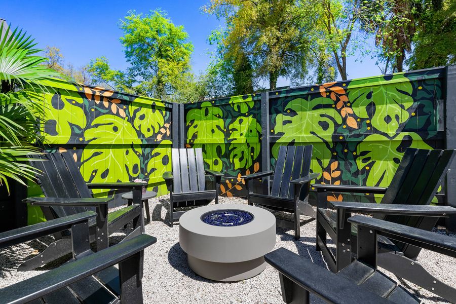 Fire pit + custom mural with seating for your group.
