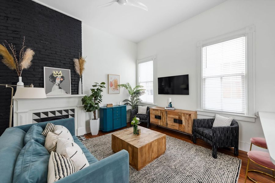 Professionally designed living room space with a Sofa Bed + Smart TV!
