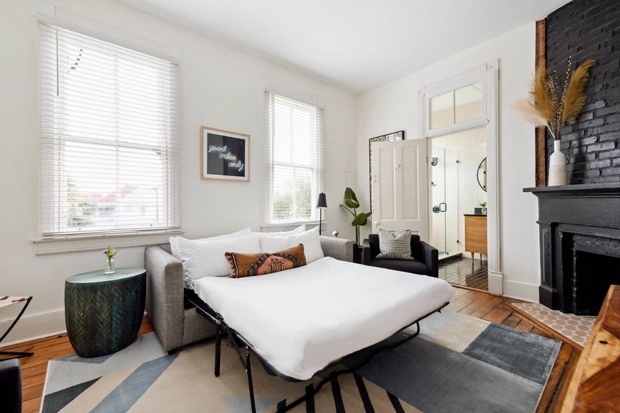 Living room space with sofa bed in Unit C