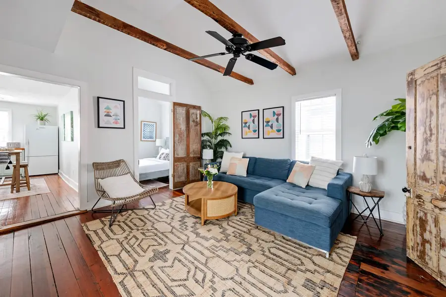 Professionally designed living room space with a Tempur-Pedic Sofa Bed and Smart TV!