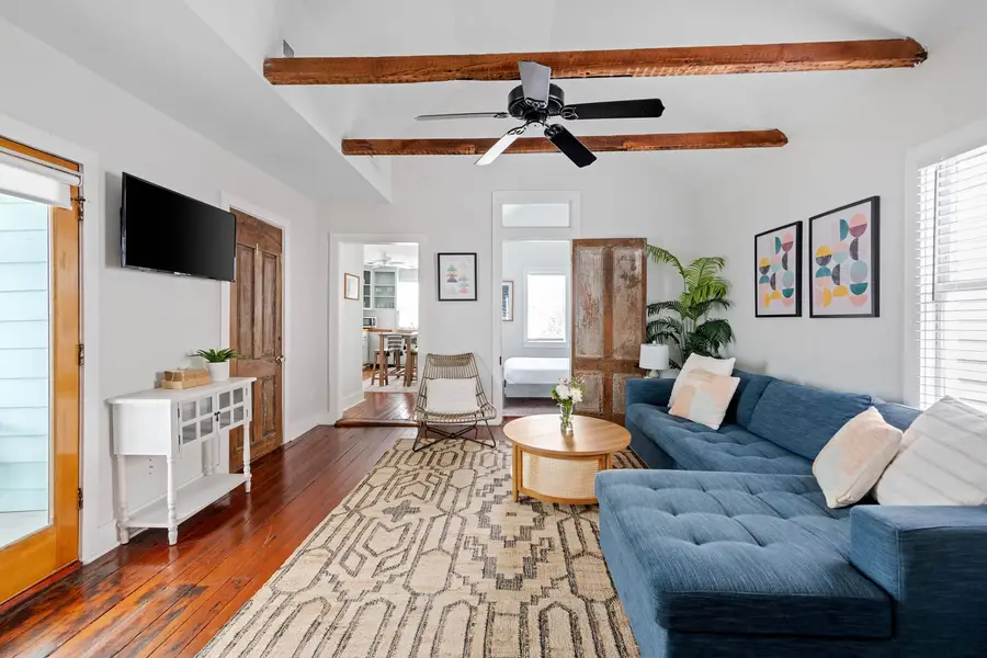 Professionally designed living room space with a Tempur-Pedic Sofa Bed and Smart TV!