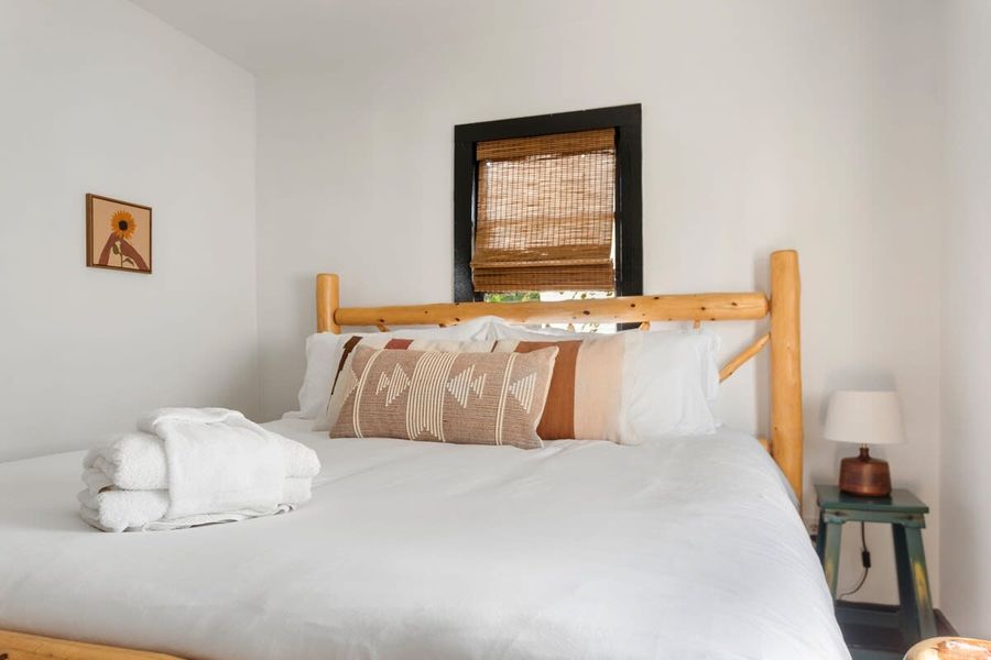 Luxurious memory foam mattress with linens and towels provided.