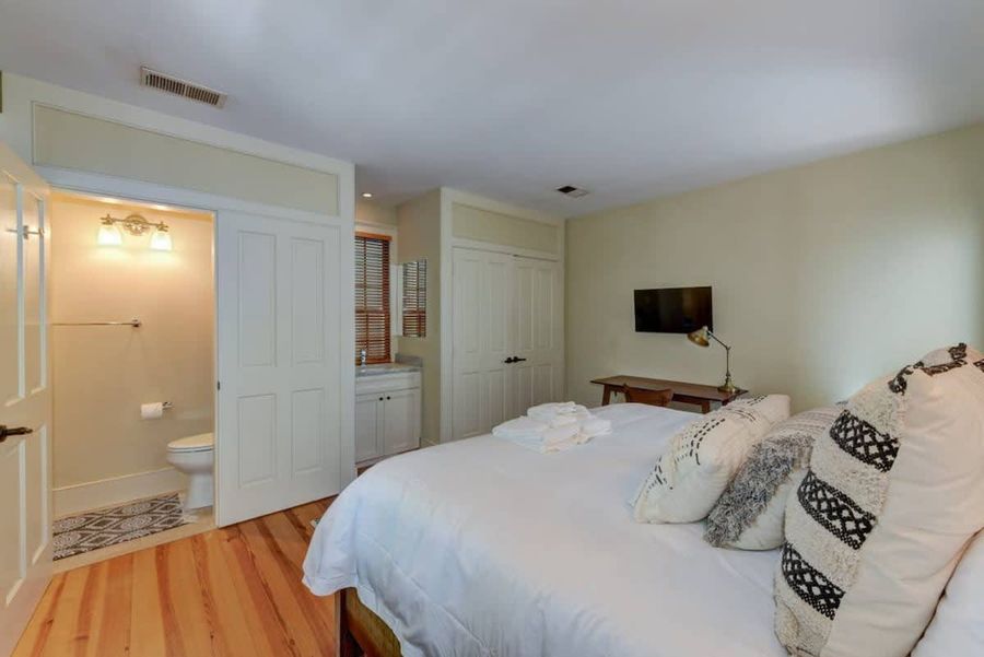 House #3: Master Bedroom with King Bed, Private Bathroom, TV, Workspace and Rooftop Patio Access!