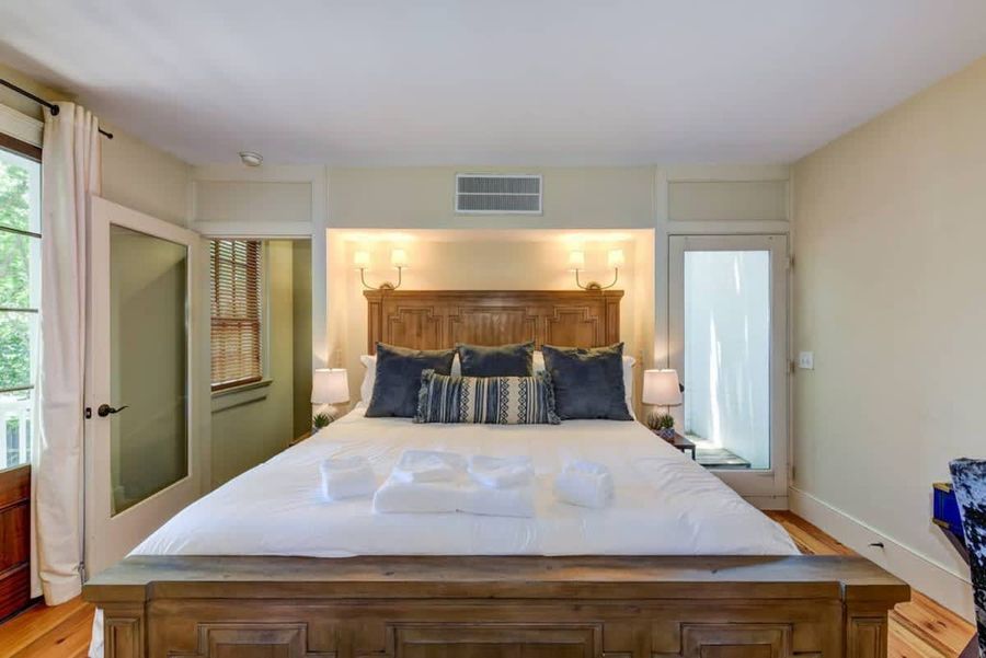 House #2: Master Bedroom with King Bed, Private Bathroom, TV, Workspace and Rooftop Patio Access!