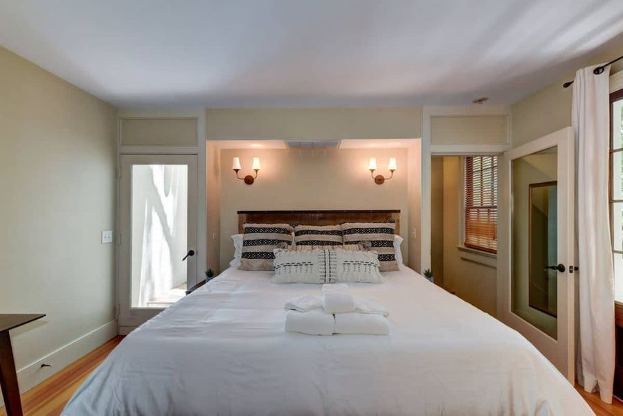 House #3: Master Bedroom with King Bed, Private Bathroom, TV, Workspace and Rooftop Patio Access!