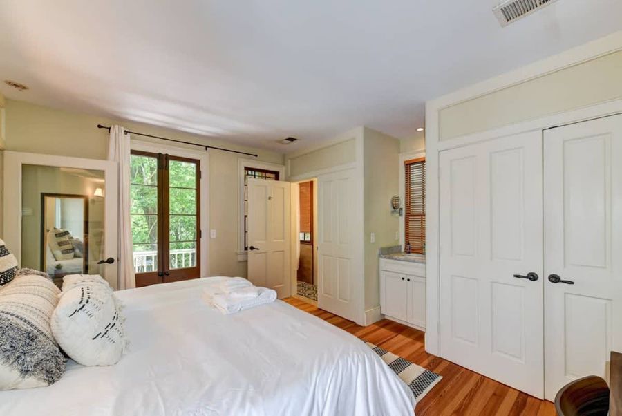 House #3: Master Bedroom with King Bed, Private Bathroom, TV, Workspace and Rooftop Patio Access!