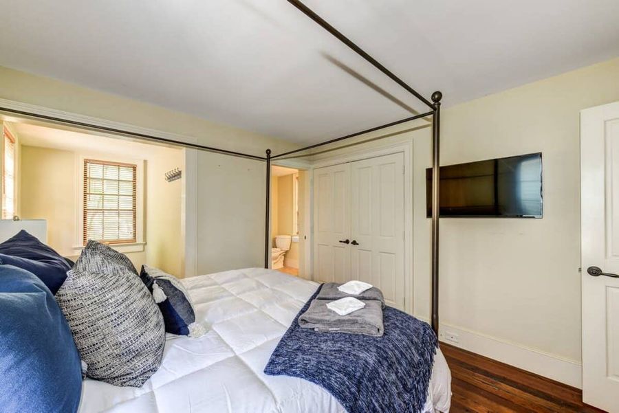 House #1: Master Bedroom with King Bed, Private Bathroom, TV, Workspace and Porch Access!