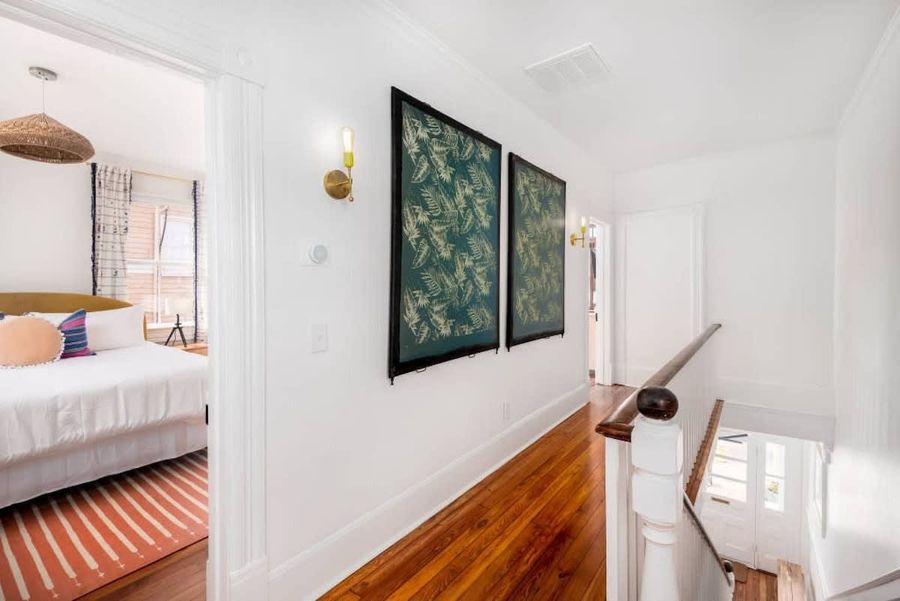 Upstairs hallway with one of a kind art