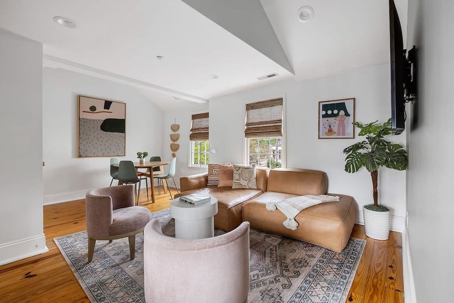 Spacious living room with plenty of seating for your group. This is living room #3! 