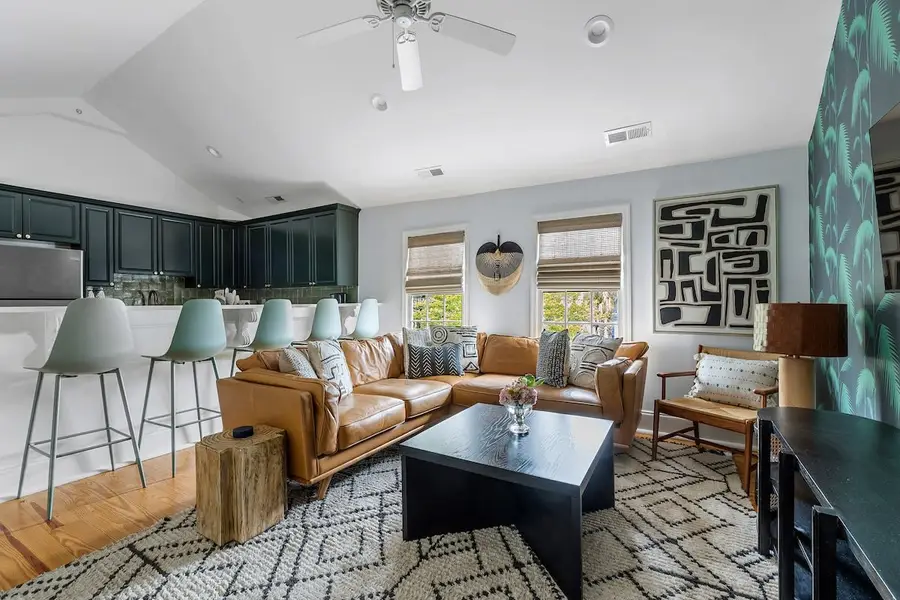 Spacious living room with plenty of seating for your group 