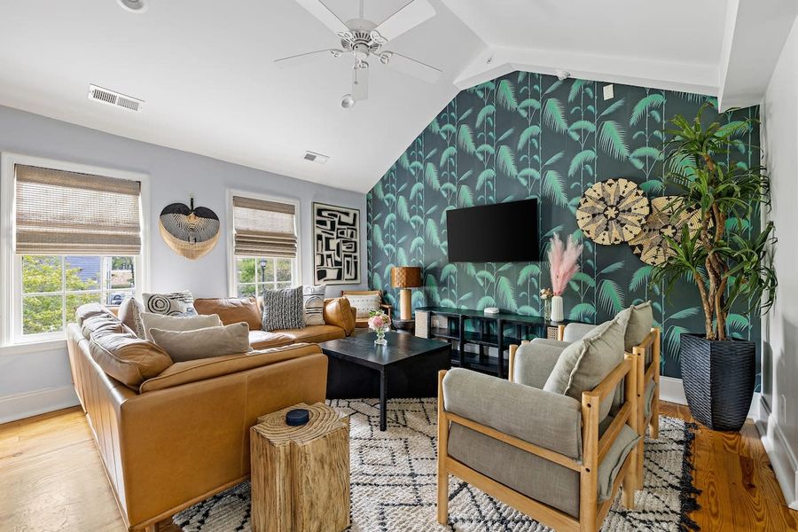 Spacious living room with plenty of seating for your group 