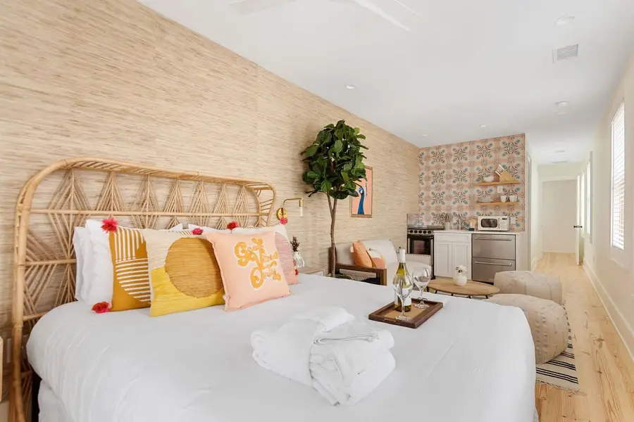 Bedroom #1: King Bed, TV, Ceiling Fan, Kitchenette & Seating  