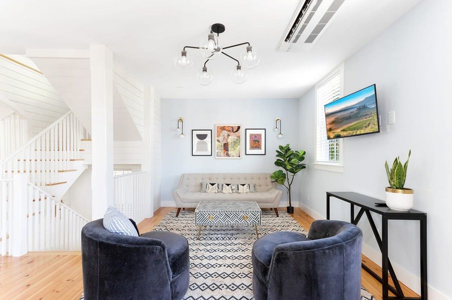 Professionally decorated & furnished living space with a sleeper sofa 
