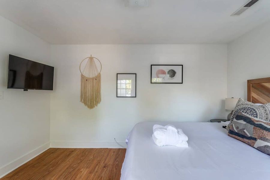Bedroom #1 with a TV and closet!