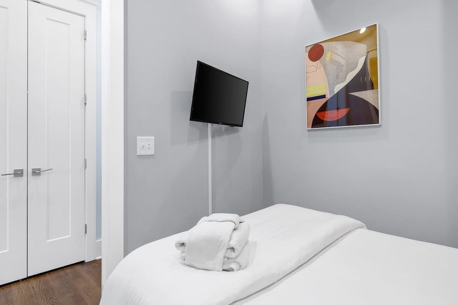 Bedroom #2 with Full Bed, TV, and En-Suite full bathroom
