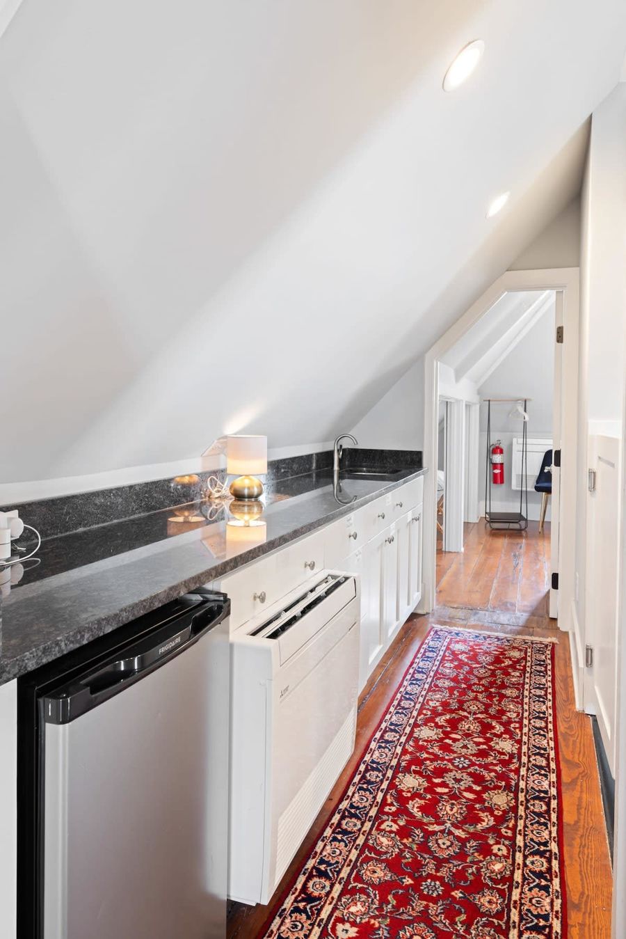 Third floor kitchenette between bedrooms 3 and 4.
