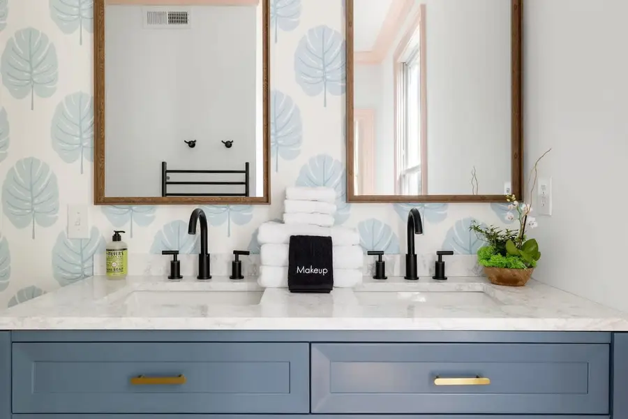 Bathroom 1: Walk-in shower and double sink vanity
