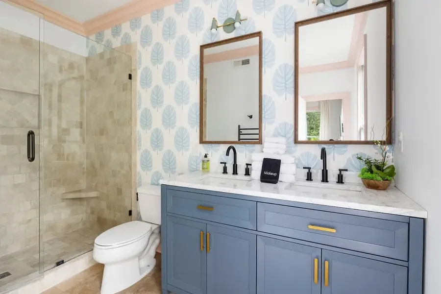 Bathroom 1: Walk-in shower and double sink vanity