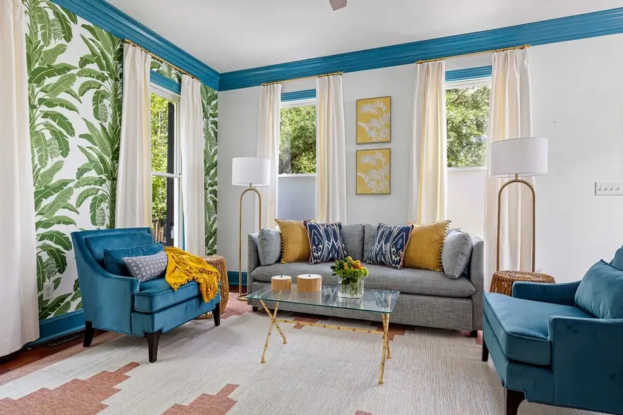 Spacious living room with plenty of seating + pullout sofa bed