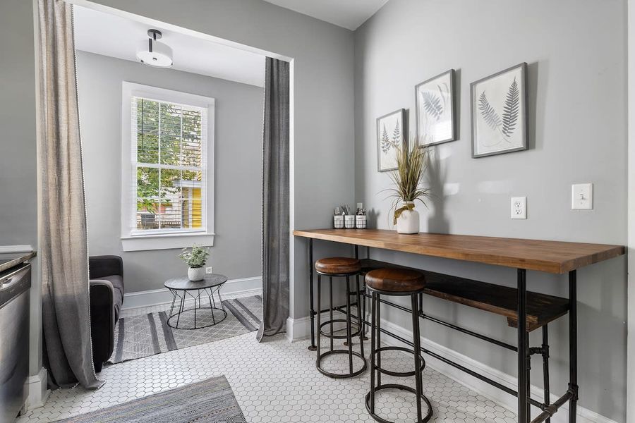 Full kitchen with seating and dining area! 