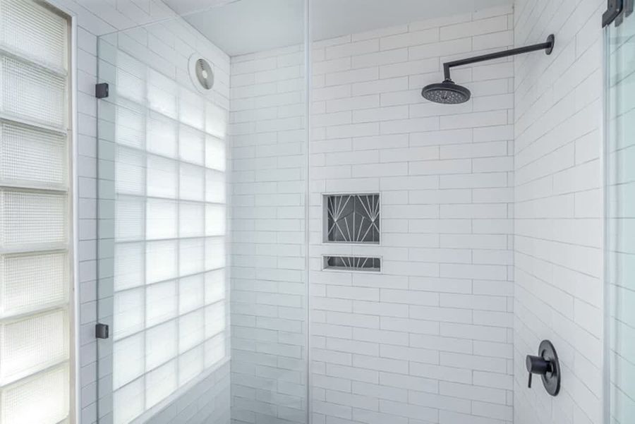 Full tile shower with a rain head! 