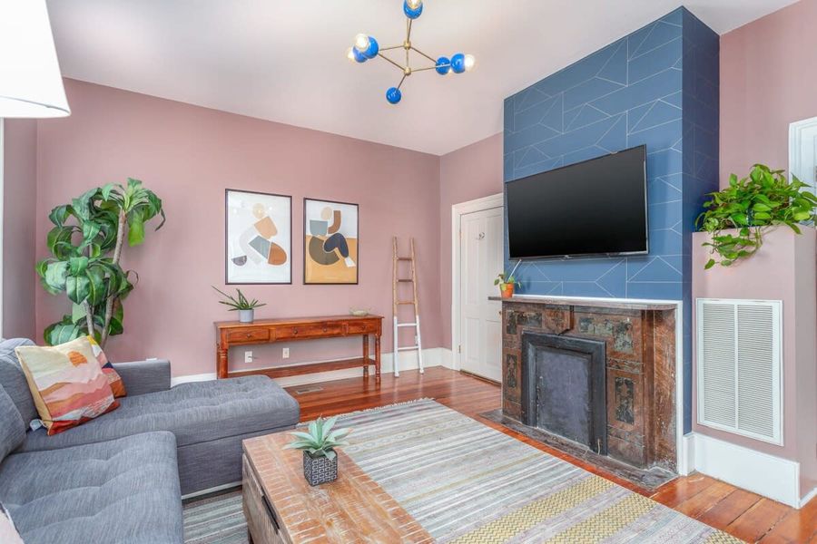 Living Room space with a Sofa Bed + Smart TV