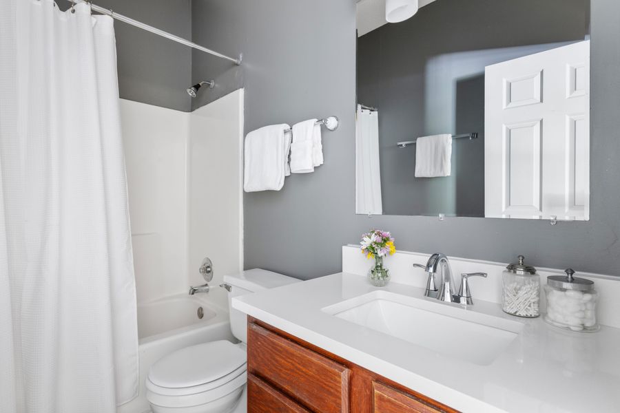 Full Bathroom with a shower/tub combo