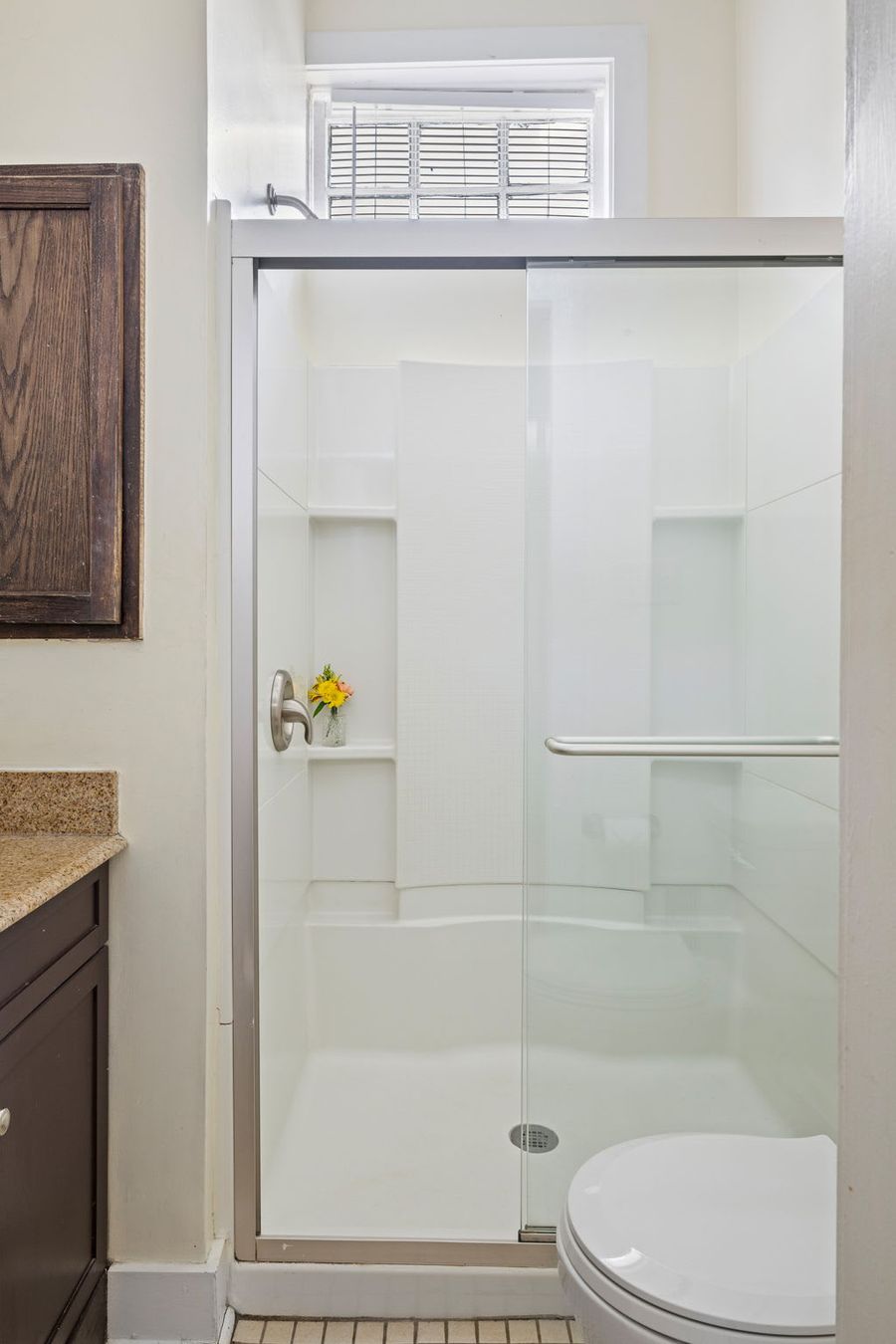 Full bathroom with walk-in shower