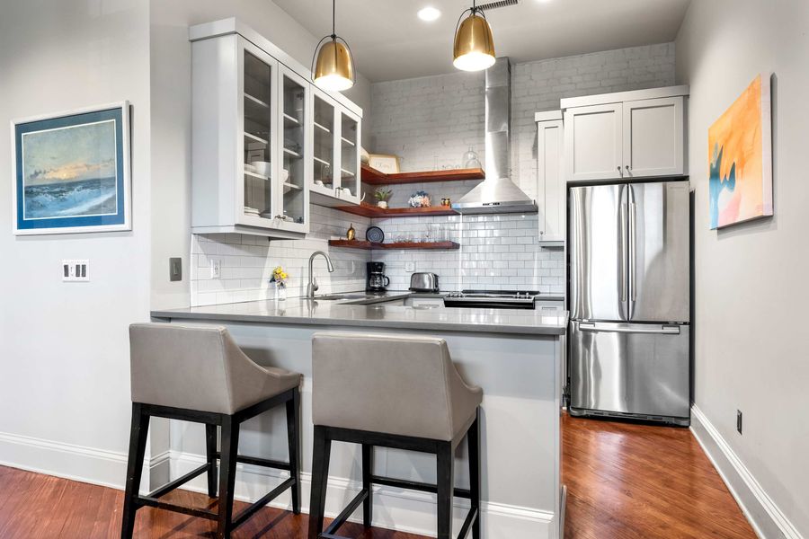 UNIT DEF Fully equipped kitchen with everything you need to cook a meal with seating for two!