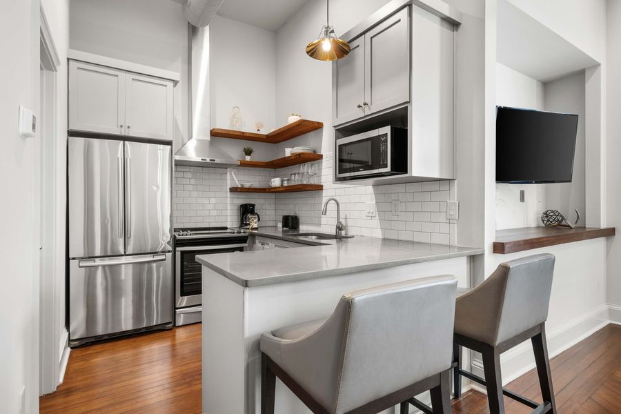 Fully equipped kitchen with everything you need to cook a meal with seating for two! 