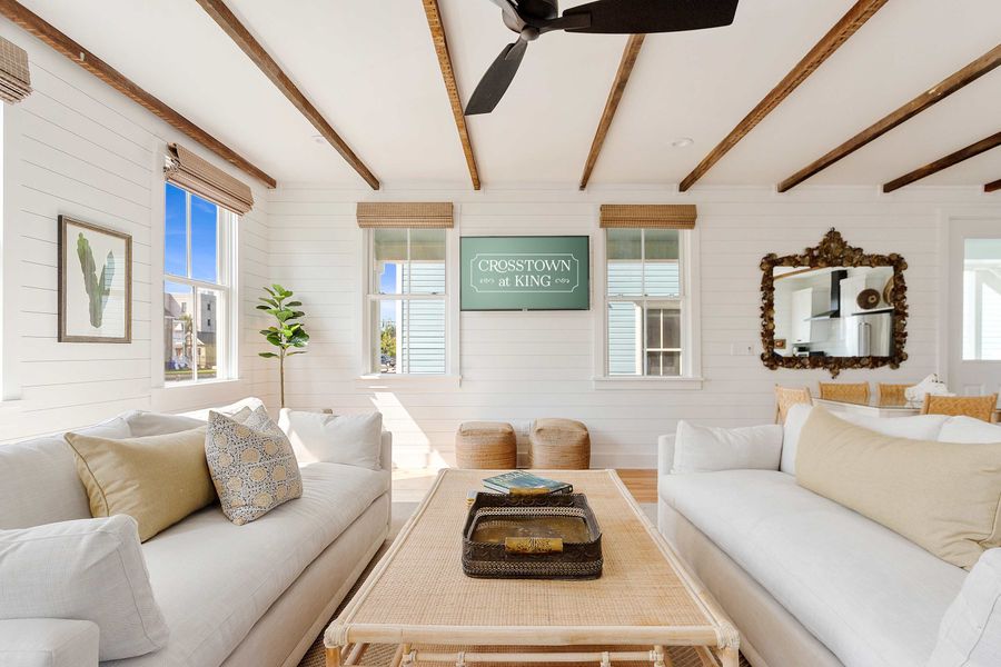Spacious living room on the first floor with seating for your entire group. There are two living rooms total! 
