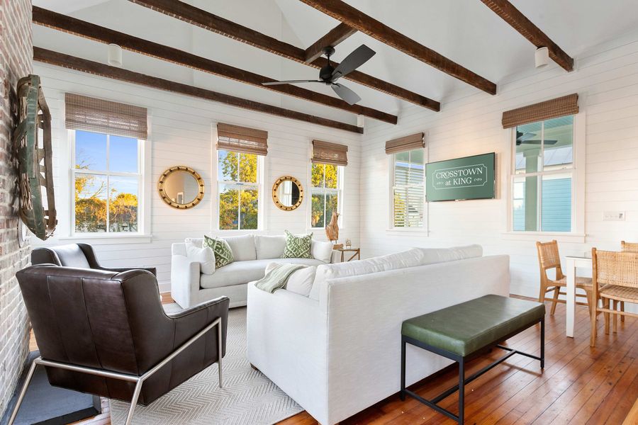 Spacious living room on the second floor with seating for your entire group. There are two living rooms total! 