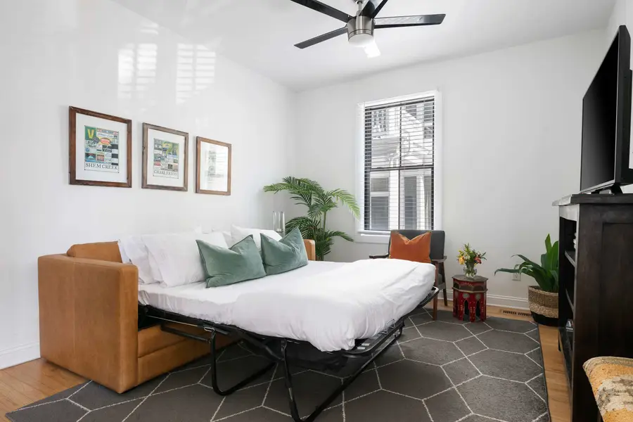 Living room space with a sleeper sofa
