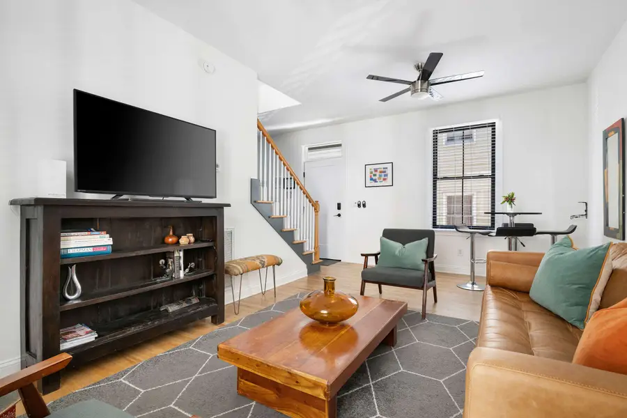 Spacious living room with seating for your group!
