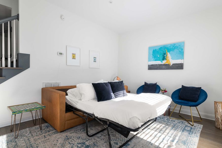 Living room space #2  with a sleeper sofa. We are looking forward to hosting you in beautiful downtown Charleston, SC!