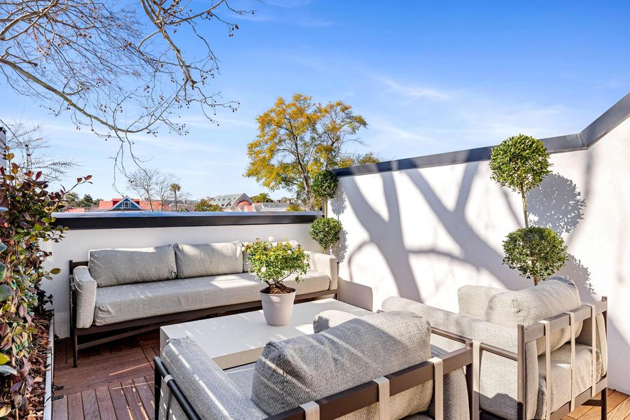Plenty of outdoor seating for your group on the private rooftop! 