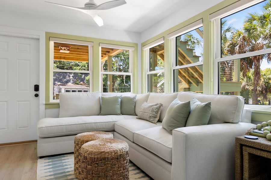 Open layout spacious living room with seating for your entire group + TV and kitchen and dining