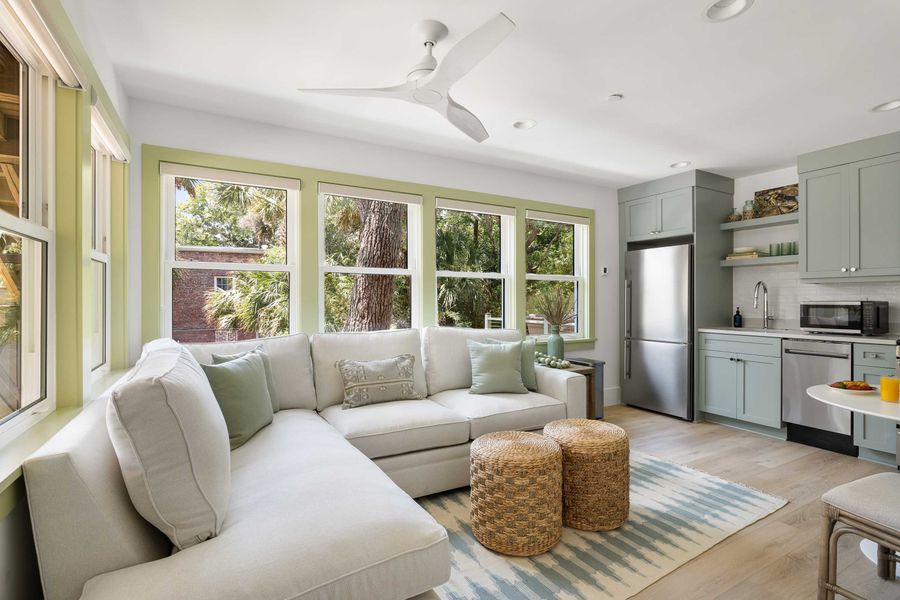 Open layout spacious living room with seating for your entire group + kitchen!