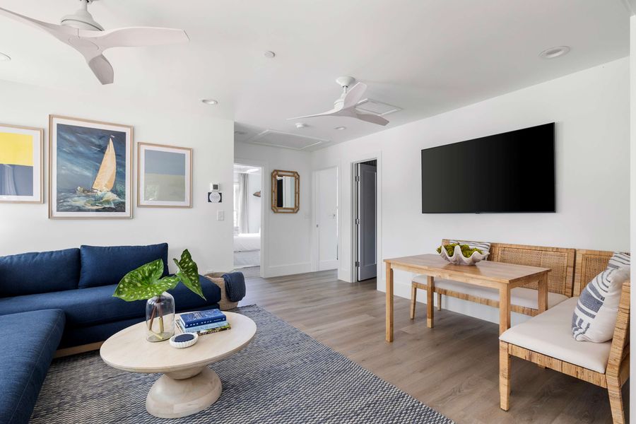 Spacious living room with seating for your entire group + TV and dining seating for four guests