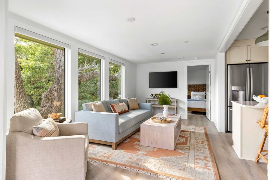 Spacious living room with seating for your entire group with TV!
