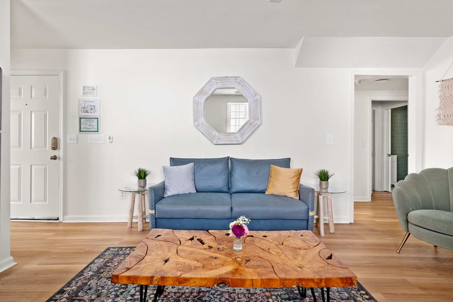 Spacious living room with plenty of seating space for your group! 