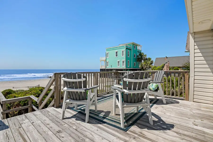Plenty of outdoor seating on the deck with beach views! 