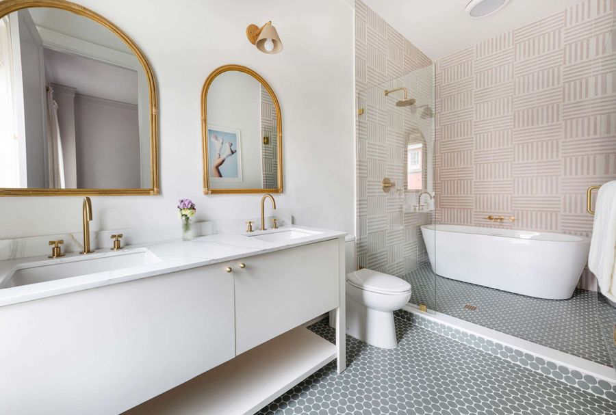 Newly renovated bathrooms with designer tile work and a deep soaking tub for the ultimate R&R!