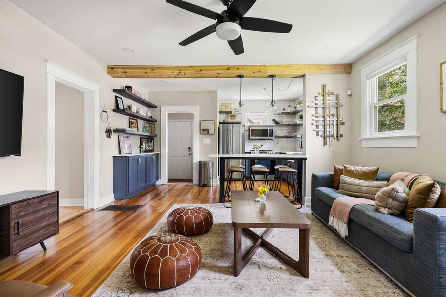 Spacious living room with plenty of seating and a Smart TV! 