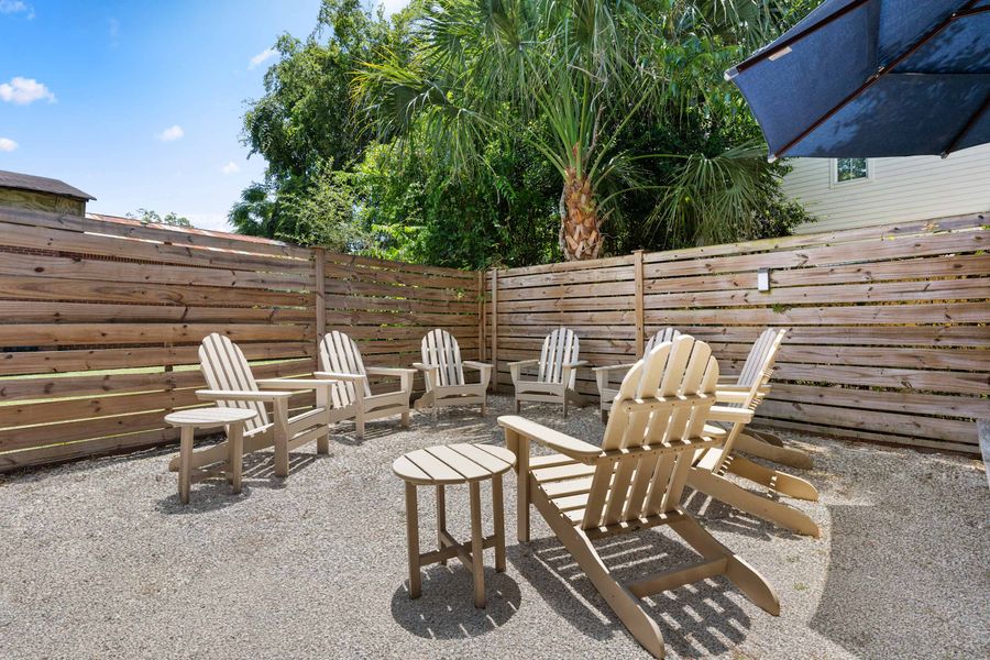 Outdoor seating space in the fenced in backyard :) 