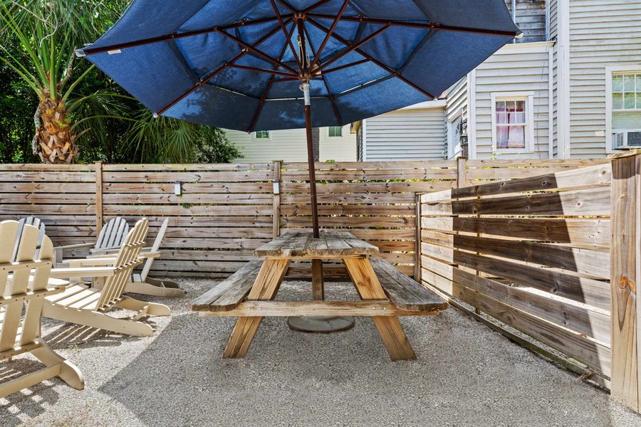 Outdoor seating space in the fenced in backyard :) 