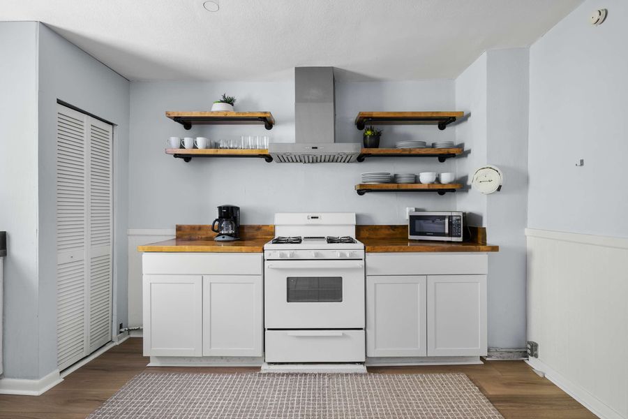 Kitchen with needed cooking supplies 