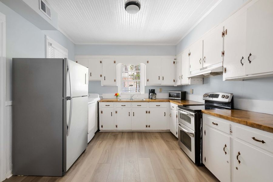 Kitchen with needed cooking supplies 