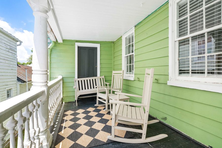 Charleston porch with seating for your group 